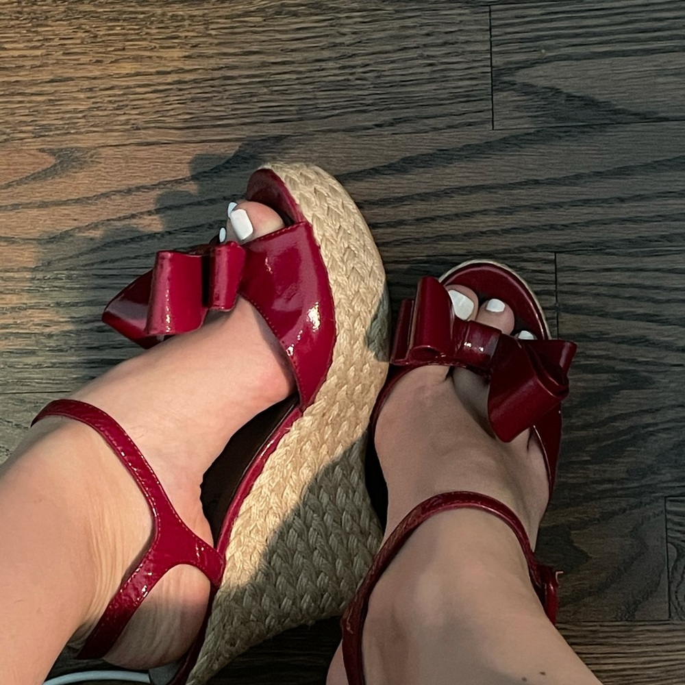 Vibrant cherry red patent leather wedges